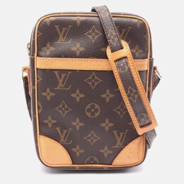Louis Vuitton: Коричневая сумка через плечо 