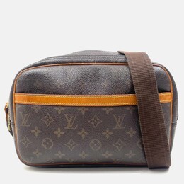 Louis Vuitton: Коричневая сумка через плечо 