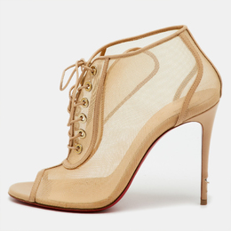 Christian Louboutin: Бежевые ботинки 