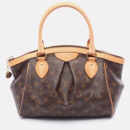 Louis Vuitton: Коричневая сумка 