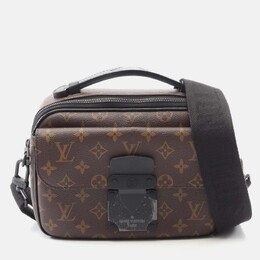 Louis Vuitton: Коричневая сумка 