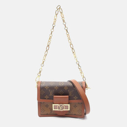 Louis Vuitton: Коричневая сумка 