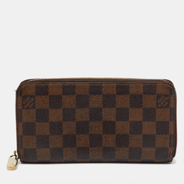 Louis Vuitton: Коричневый кошелёк  Zippy