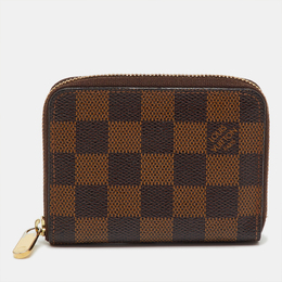 Louis Vuitton: Коричневый кошелёк  Zippy