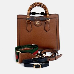 Gucci: Коричневая сумка-шоппер 