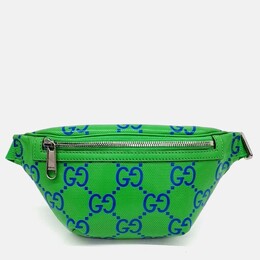 Gucci: Зелёная поясная сумка  GG
