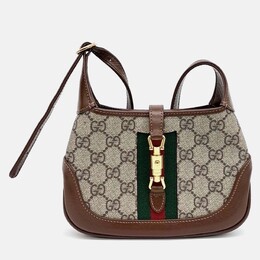 Gucci: Бежевая сумка  Jackie