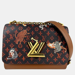 Louis Vuitton: Коричневая сумка 