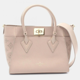 Louis Vuitton: Бежевая сумка 