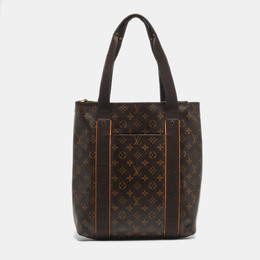 Louis Vuitton: Коричневая сумка 