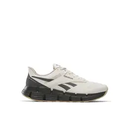 Reebok: Бежевые кроссовки  Zig