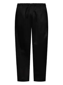 Maison Margiela: Чёрные брюки 