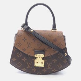 Louis Vuitton: Коричневая сумка  Tilsitt