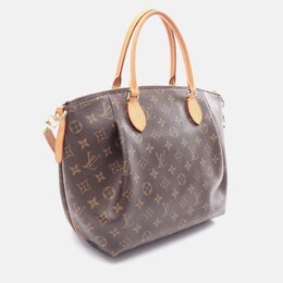 Louis Vuitton: Коричневая сумка 