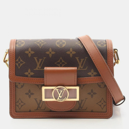Louis Vuitton: Коричневая сумка 