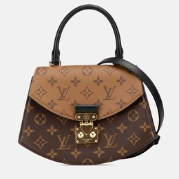 Louis Vuitton: Коричневая сумка 