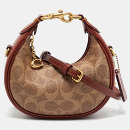 Coach: Коричневая сумка через плечо 