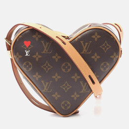 Louis Vuitton: Коричневая сумка  Coeur