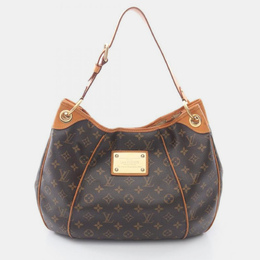 Louis Vuitton: Коричневая сумка 