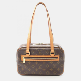 Louis Vuitton: Коричневая сумка 