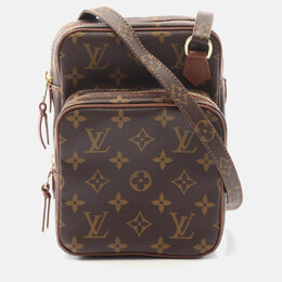 Louis Vuitton: Коричневая сумка 