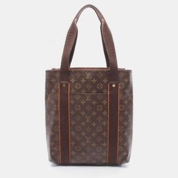 Louis Vuitton: Коричневі сумки шопери 