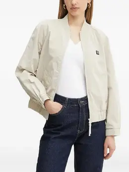 Armani Exchange: Бежевая куртка 