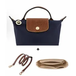 Longchamp: Тёмная сумка 