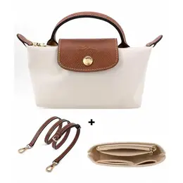 Longchamp: Бежевая сумка 