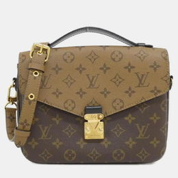 Louis Vuitton: Коричневая сумка  Pochette