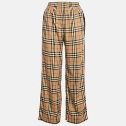 Burberry: Бежевые брюки 
