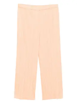 Pleats Please Issey Miyake: Оранжевые брюки 