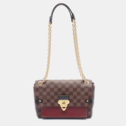 Louis Vuitton: Коричневая сумка 