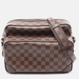 Louis Vuitton: Коричневая сумка 