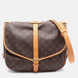 Louis Vuitton: Коричневая сумка 