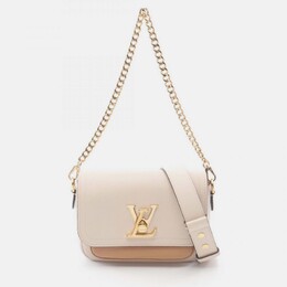 Louis Vuitton: Бежевая сумка 