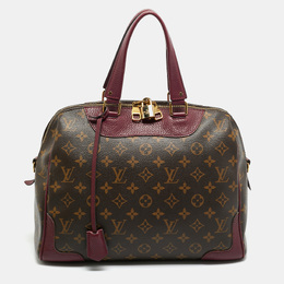 Louis Vuitton: Коричневая сумка 