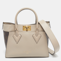 Louis Vuitton: Бежевая сумка 