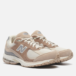 New Balance: Коричневые кроссовки 