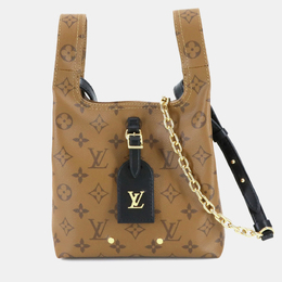 Louis Vuitton: Коричневая сумка 