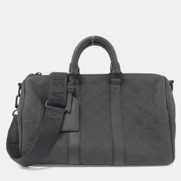 Louis Vuitton: Чорні сумки  Keepall