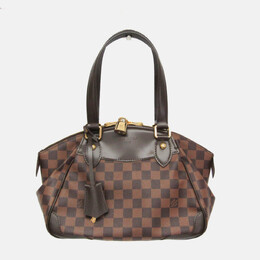 Louis Vuitton: Коричневая сумка 