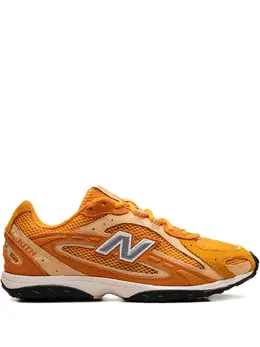 New Balance: Оранжевые кроссовки 