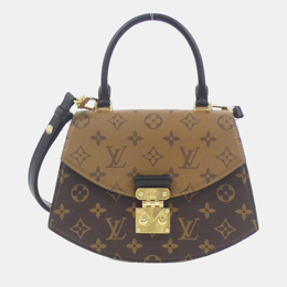 Louis Vuitton: Коричневая сумка 