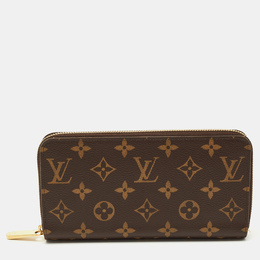 Louis Vuitton: Коричневый кошелёк  Zippy