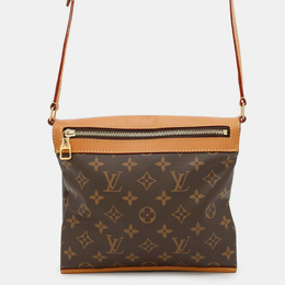 Louis Vuitton: Коричневая сумка 