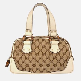 Gucci: Бежевая сумка  GG