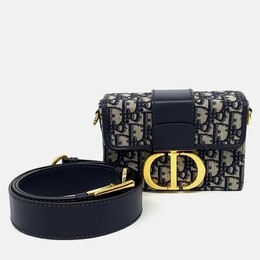 Dior: Чёрная сумка 