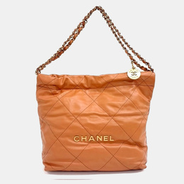 Chanel: Оранжевая сумка 