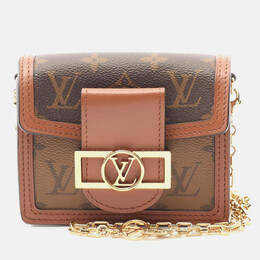 Louis Vuitton: Коричневая сумка 
